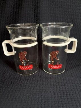 Bodum Clear Glass Monkey Mugs with White Handles and Red Logo (Pair)